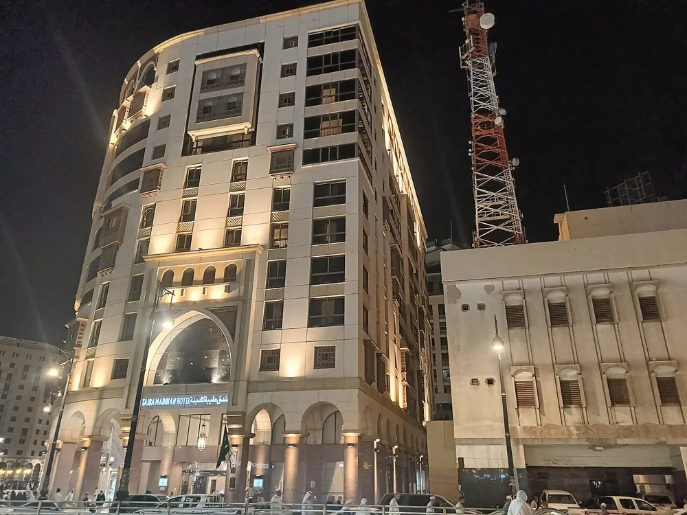 Taiba Madinah Hotel lit up at night